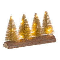 Alberi di Natale con luce alla base del tronco
