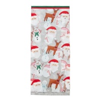 Sacchetti per caramelle trasparenti con scena natalizia 24 x 10 cm - Wilton - 20 pz.