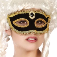 Maschera veneziana decorata in nero e oro