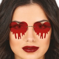Occhiali a forma di cuore con gocce di sangue